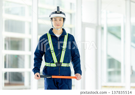 Traffic controller directing traffic 137835514