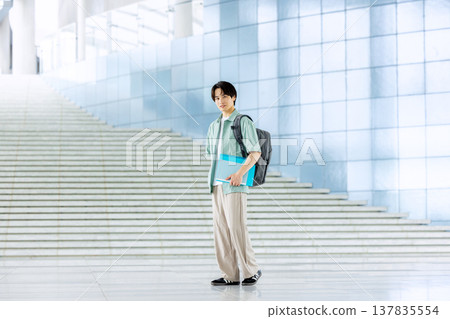 College student walking on campus 137835554