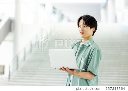 college student with laptop college student with laptop 137835564