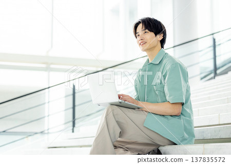 college student with laptop college student with laptop 137835572