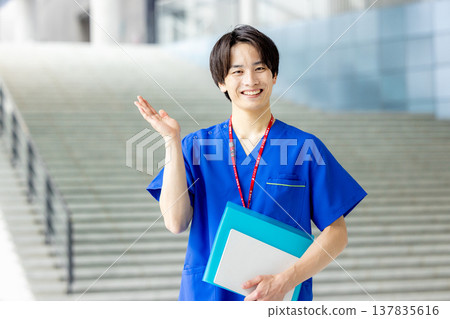 Young doctor working in a hospital 137835616