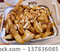 Poutine, a national dish originating in Canada. 137836085
