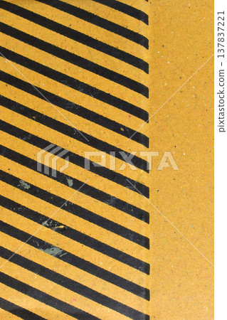 striped black and yellow cardboard box texture background 137837221