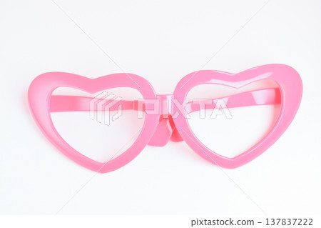 pink heart shape of glasses on white background 137837222