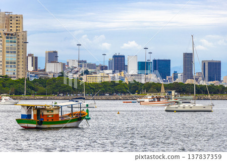 Urca coast beach promenade with boats Rio de Janeiro Brazil. Urca coast beach promenade with boats Rio de Janeiro Brazil. 137837359