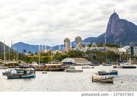 Urca coast beach promenade with boats Rio de Janeiro Brazil. Urca coast beach promenade with boats Rio de Janeiro Brazil. 137837363