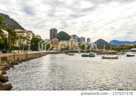 Urca coast beach promenade with boats Rio de Janeiro Brazil. Urca coast beach promenade with boats Rio de Janeiro Brazil. 137837370