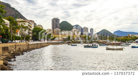 Urca coast beach promenade with boats Rio de Janeiro Brazil. Urca coast beach promenade with boats Rio de Janeiro Brazil. 137837372