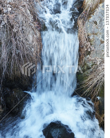 A waterway flowing through the residential area of Otaki Village A waterway flowing through the residential area of Otaki Village 137837834