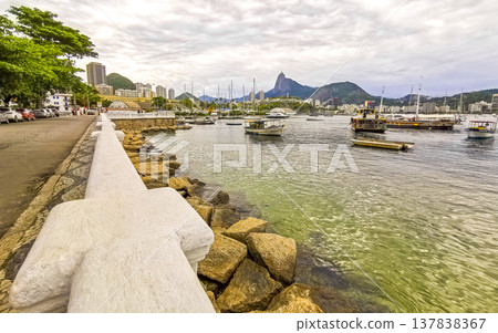 Urca coast beach promenade with boats Rio de Janeiro Brazil. Urca coast beach promenade with boats Rio de Janeiro Brazil. 137838367