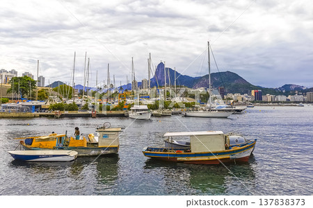 Urca coast beach promenade with boats Rio de Janeiro Brazil. Urca coast beach promenade with boats Rio de Janeiro Brazil. 137838373