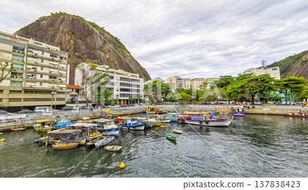Urca coast beach promenade with boats Rio de Janeiro Brazil. Urca coast beach promenade with boats Rio de Janeiro Brazil. 137838423