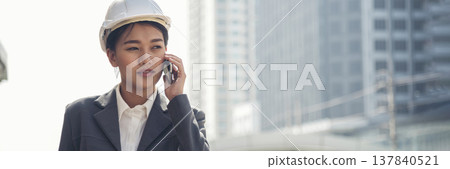 Banner Woman engineer entrepreneur construction industry worker. Banner Female engineer working refinery oil plant manufacturing. Civil engineering construction hard hat safety helmet with copy space Banner Woman engineer entrepreneur construction industry worker. Banner Female engineer working refinery oil plant manufacturing. Civil engineering construction hard hat safety helmet with copy space 137840521