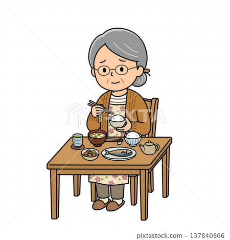 一位老婦人獨自吃早餐。 137840866