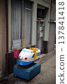 A children's ride shaped like a bullet train placed in the shopping street. 137841418