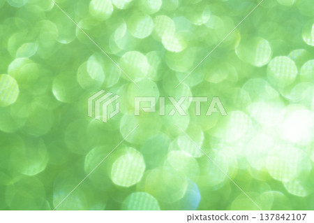 Light green glitter background material Light green glitter background material 137842107
