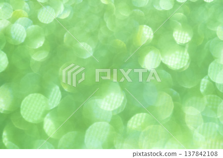 Light green glitter background material Light green glitter background material 137842108