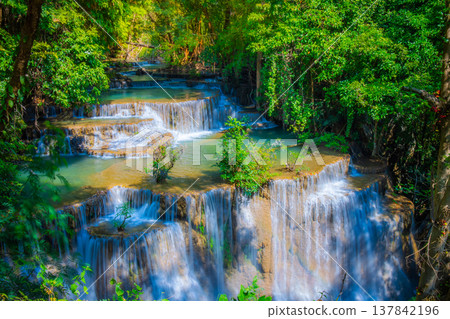 Landscape of Huai Mae Khamin waterfall Srinakarin Is a waterfall in the deep forest at Kanchanaburi, Thailand. Landscape of Huai Mae Khamin waterfall Srinakarin Is a waterfall in the deep forest at Kanchanaburi, Thailand. 137842196