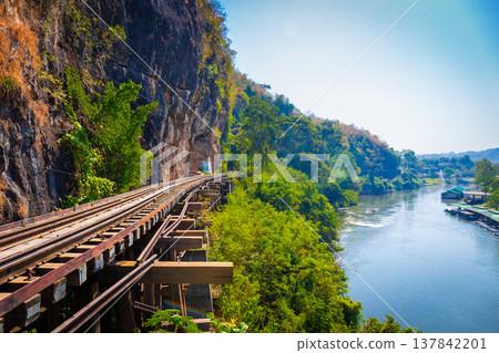 The Death Railway crossing kwai river with Krasae Cave in Kanchanaburi Thailand. Important landmark and destination to visiting and world war II history builted 137842201