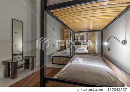 Modern Hostel Dormitory with Bunk Beds and Double Bed 137842387