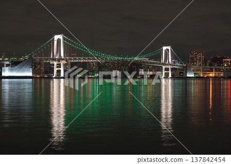 The night view of the Rainbow Bridge and Tokyo Bay from Toyosu Gururi Park The night view of the Rainbow Bridge and Tokyo Bay from Toyosu Gururi Park 137842454
