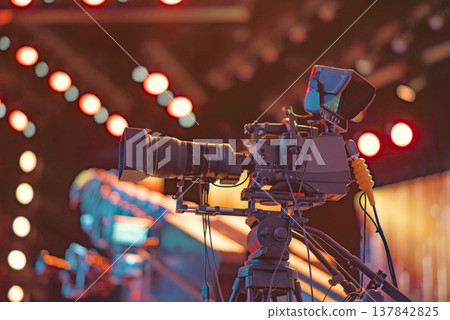 Professional Broadcast TV Camera on Tripod at Live Concert with copy space Professional Broadcast TV Camera on Tripod at Live Concert with copy space 137842825
