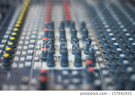 Close-up of Professional Analog Audio Mixing Console Knobs with copy space 137842855