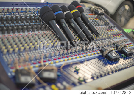 Professional Wireless Microphones on Mixing Console Set for Outdoor Event with copy space 137842860