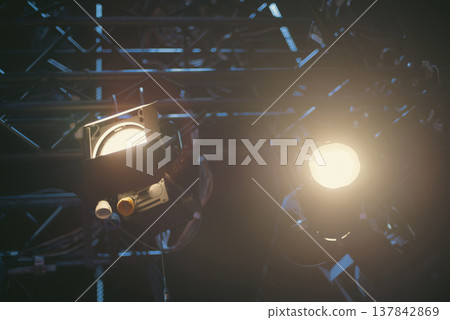 Professional Studio Spotlights Glowing in Dark Backstage with copy space 137842869