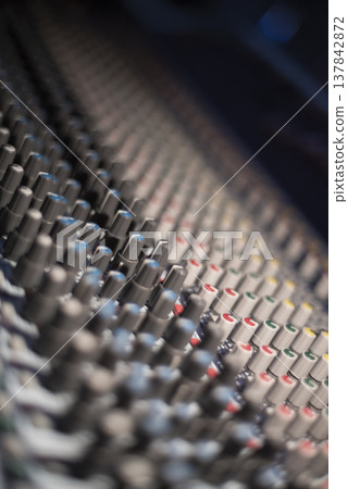 Professional Analog Audio Mixing Console Knobs Close-up with copy space Professional Analog Audio Mixing Console Knobs Close-up with copy space 137842872