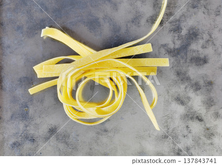 Italian egg pasta tagliatelle Italian egg pasta tagliatelle 137843741