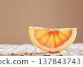 Slice of  grapefruit studio shot 137843743