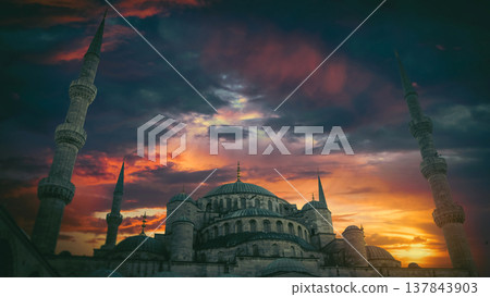 Blue Mosque in Istanbul under dramatic fiery sunset sky with copy space Blue Mosque in Istanbul under dramatic fiery sunset sky with copy space 137843903
