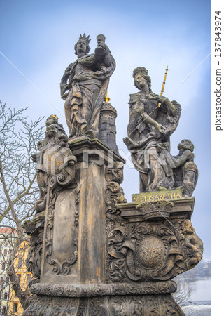 statues on the Charles Bridge, evening Prague. Czech Republic 137843974