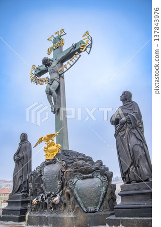 statues on the Charles Bridge, evening Prague. Czech Republic 137843976