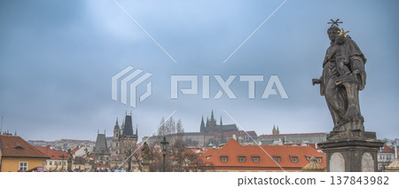 statues on the Charles Bridge, evening Prague. Czech Republic 137843982