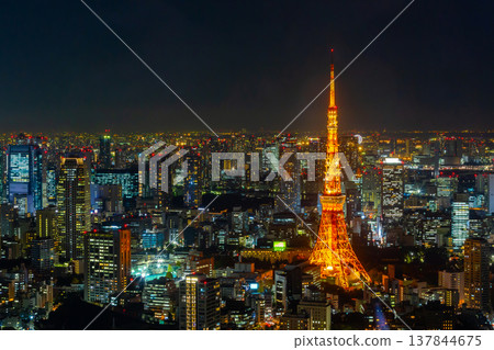 Tokyo skyline at night, with its tall buildings and beautiful lights, is a popular destination for tourists from all over the world and is an important business and economic city. Tokyo skyline at night, with its tall buildings and beautiful lights, is a popular destination for tourists from all over the world and is an important business and economic city. 137844675