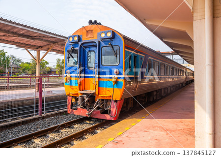 Diesel rail is a fast intercity train in Thailand leaving the station 137845127