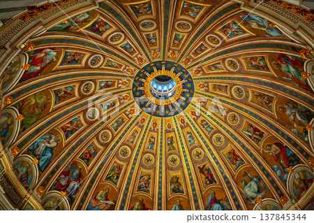 Beautiful dome with many detailed paintings in a large building Beautiful dome with many detailed paintings in a large building 137845344