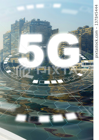5G internet connections reflect in the waters of a busy cityscape by the river 5G internet connections reflect in the waters of a busy cityscape by the river 137845444