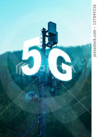 5G internet tower stands tall against a clear sky and green hills during the day 5G internet tower stands tall against a clear sky and green hills during the day 137845516
