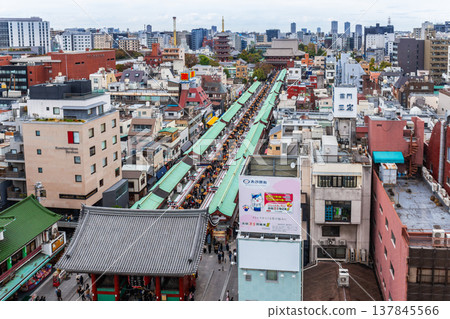 Top view of Asakusa area city landmark and Sensoji Temple, symbolized by large red lanterns, are a popular destination. 137845566