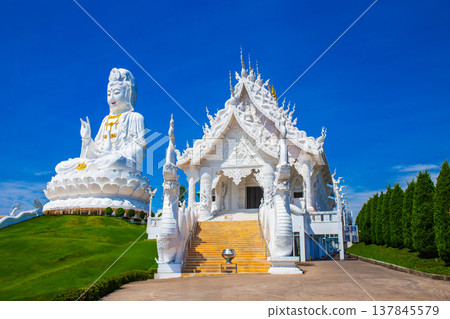 Landscape of Wat Huay Pla Kung temple with white temple and Statue of Guan Yin travel destination the famous place religious attractions of Chiang Rai province, Northern of Thailand. Landscape of Wat Huay Pla Kung temple with white temple and Statue of Guan Yin travel destination the famous place religious attractions of Chiang Rai province, Northern of Thailand. 137845579