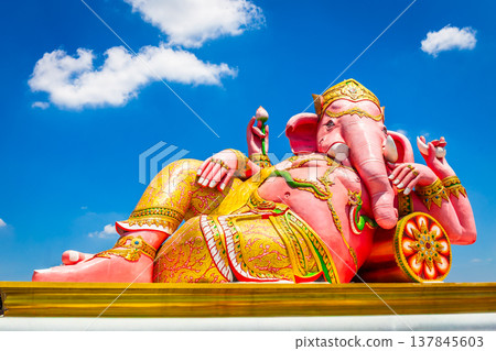 Beautiful Ganesh statue on blue sky at wat saman temple in Chachoengsao province thailand, Is highly respected by the people of Asia. Beautiful Ganesh statue on blue sky at wat saman temple in Chachoengsao province thailand, Is highly respected by the people of Asia. 137845603