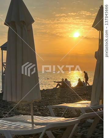 Summer sunset and relaxation on the Black Sea coast in Sochi Summer sunset and relaxation on the Black Sea coast in Sochi 137845666