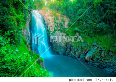 Beautiful fantastic deep forest waterfall at Haew narok waterfall, khao yai national park, Thailand Beautiful fantastic deep forest waterfall at Haew narok waterfall, khao yai national park, Thailand 137845719