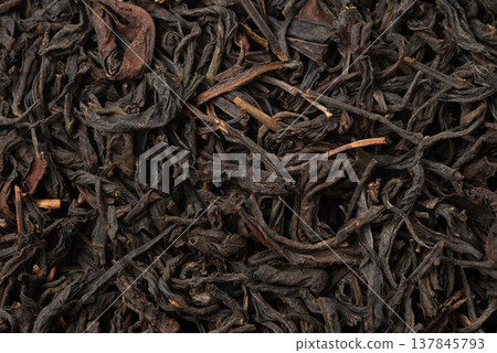 Pile of black tea isolated on white background. Pile of black tea isolated on white background. 137845793