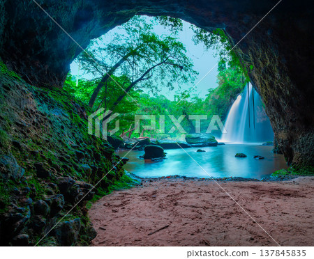 Amazing cave in deep forest with beautiful waterfalls background at Haew Suwat Waterfall in Khao Yai National Park, Thailand Amazing cave in deep forest with beautiful waterfalls background at Haew Suwat Waterfall in Khao Yai National Park, Thailand 137845835