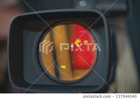 Macro of Professional Cinema Lens with Red Reflections and Copy Space 137846040