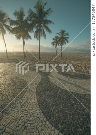 Sunrise at Copacabana Beach with Iconic Wave Mosaic and Palms with copy space. 137846047